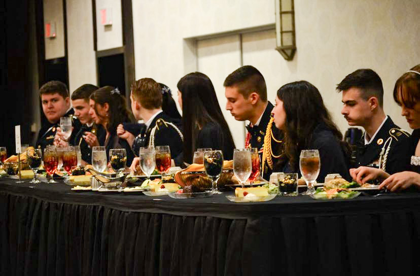 JROTC leadership staff enjoying dinner at the Mil Ball.
