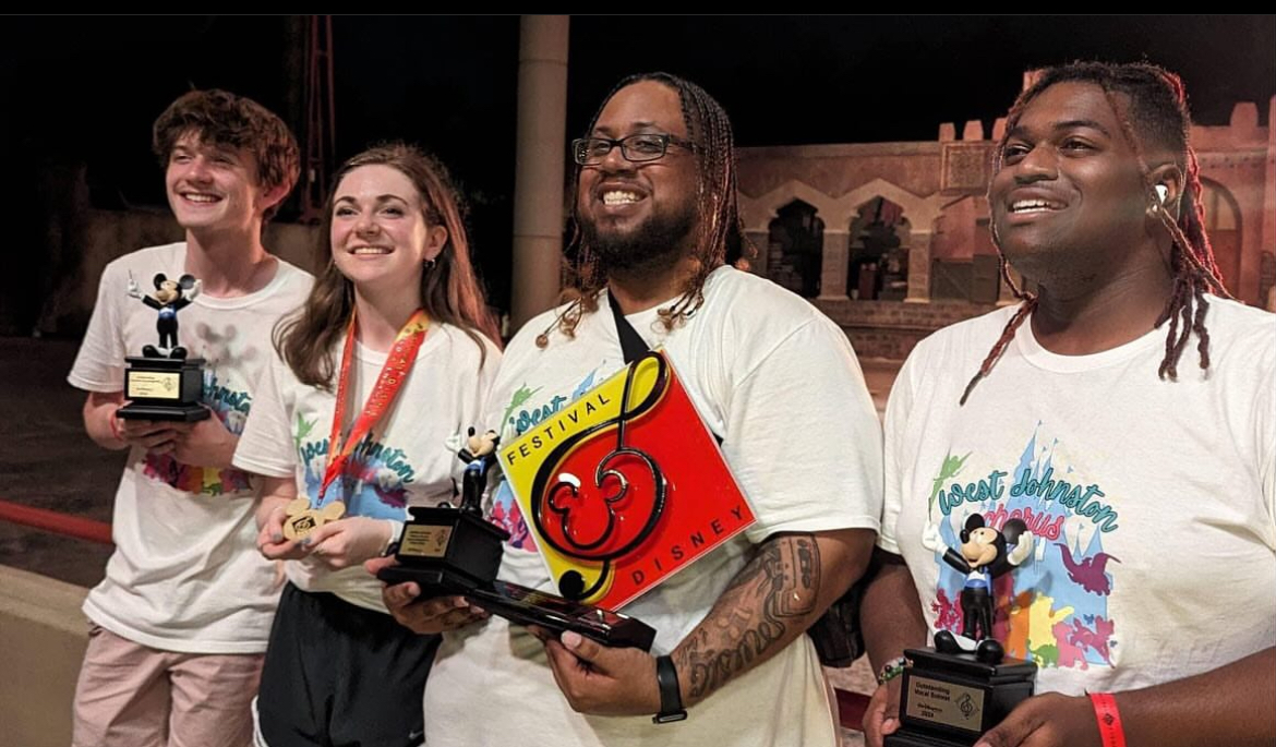 Award winners with Choral Director Joshua Johnson
From Left to right: Gabe Pfeif, Ava Grace Jernigan, Joshua Johnson and Xie Atkinson