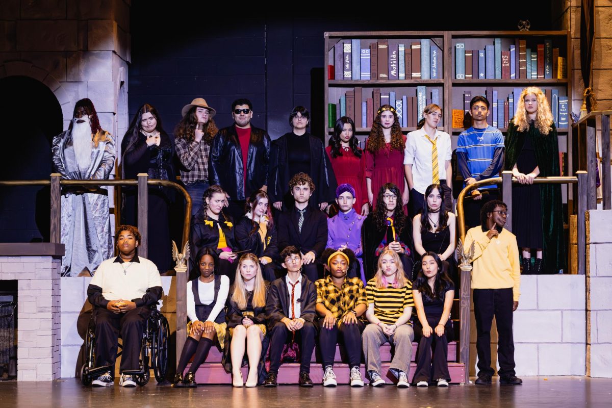 The cast of Puffs group together to take their cast photo prior to their second run of the show. 
